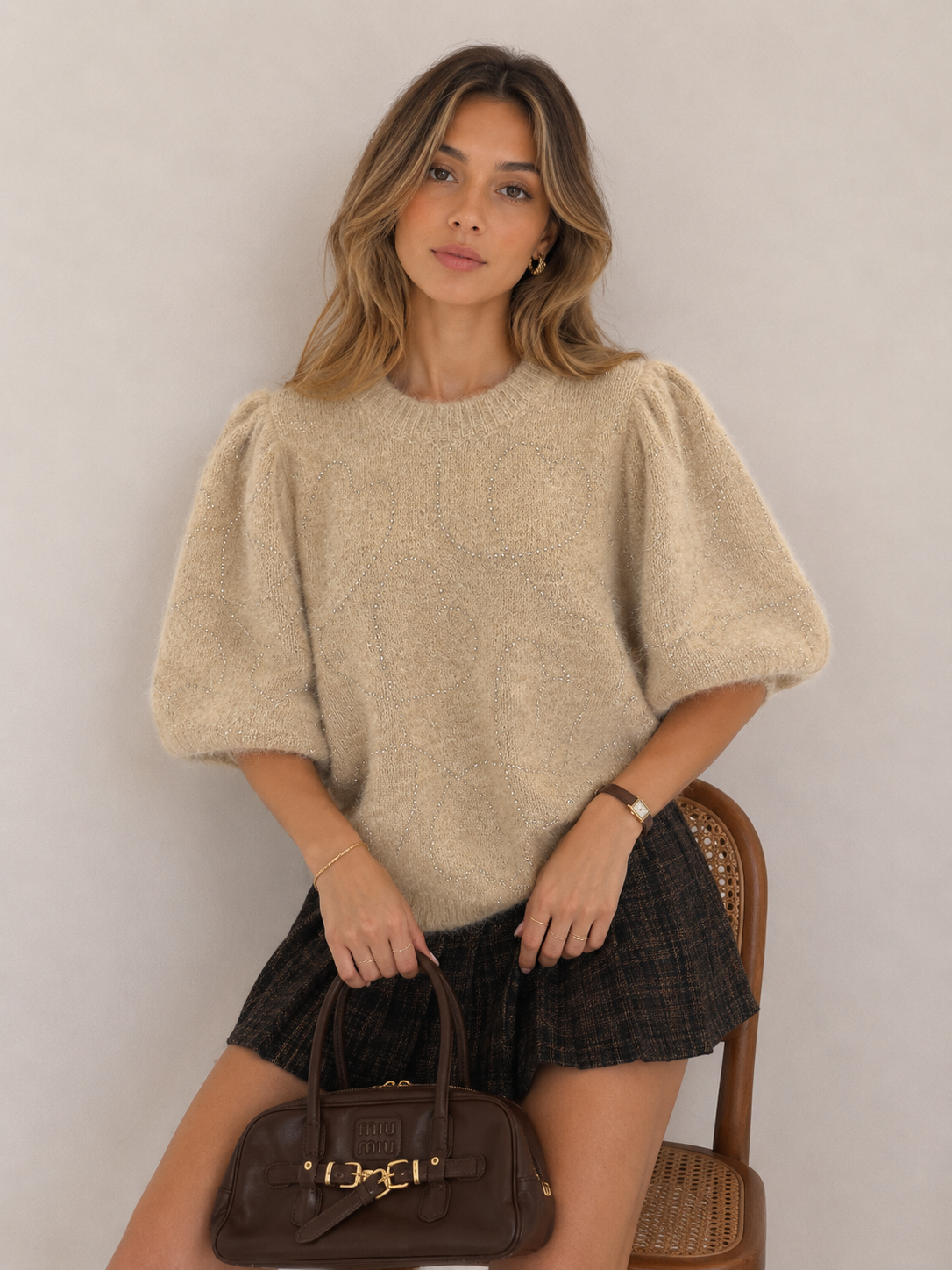 Sweter z bufkami i ćwiekami